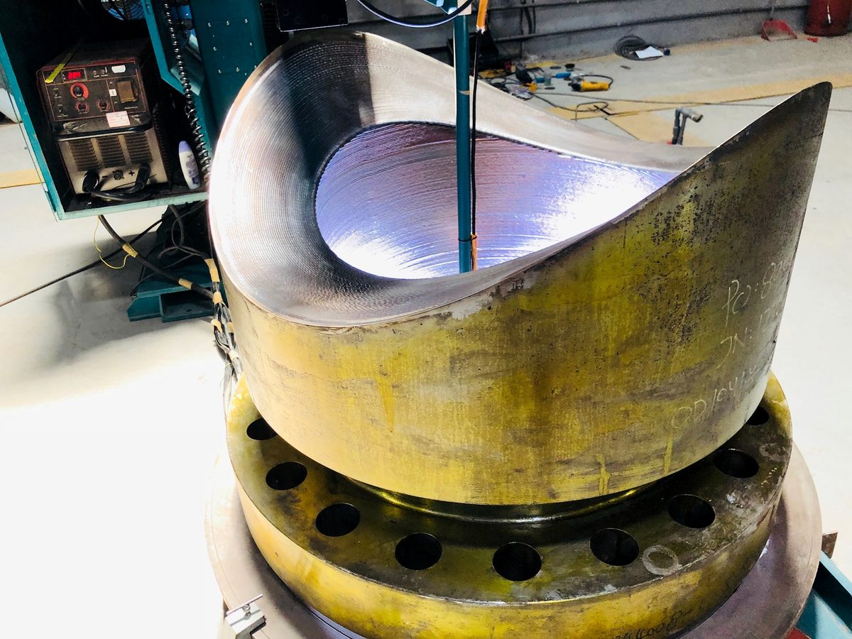 Vessel dished end on a positioner